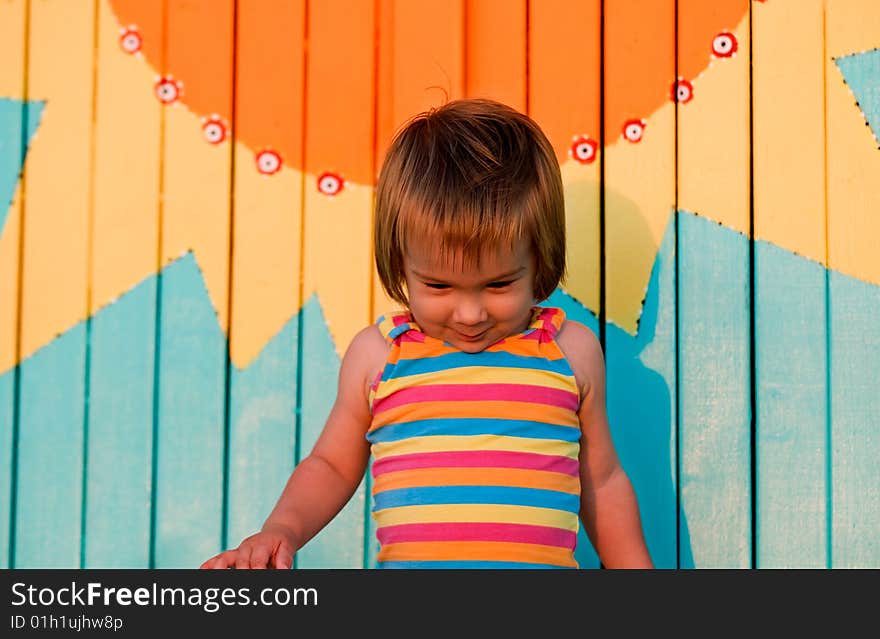 A baby-girl playing on a beach down-under. A baby-girl playing on a beach down-under