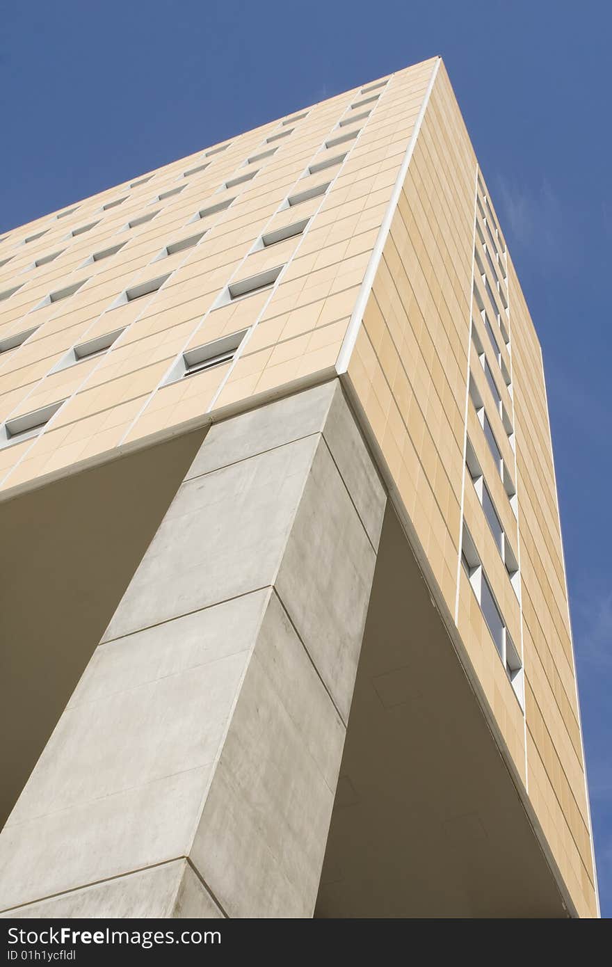 Modern office building on a background of blue sky