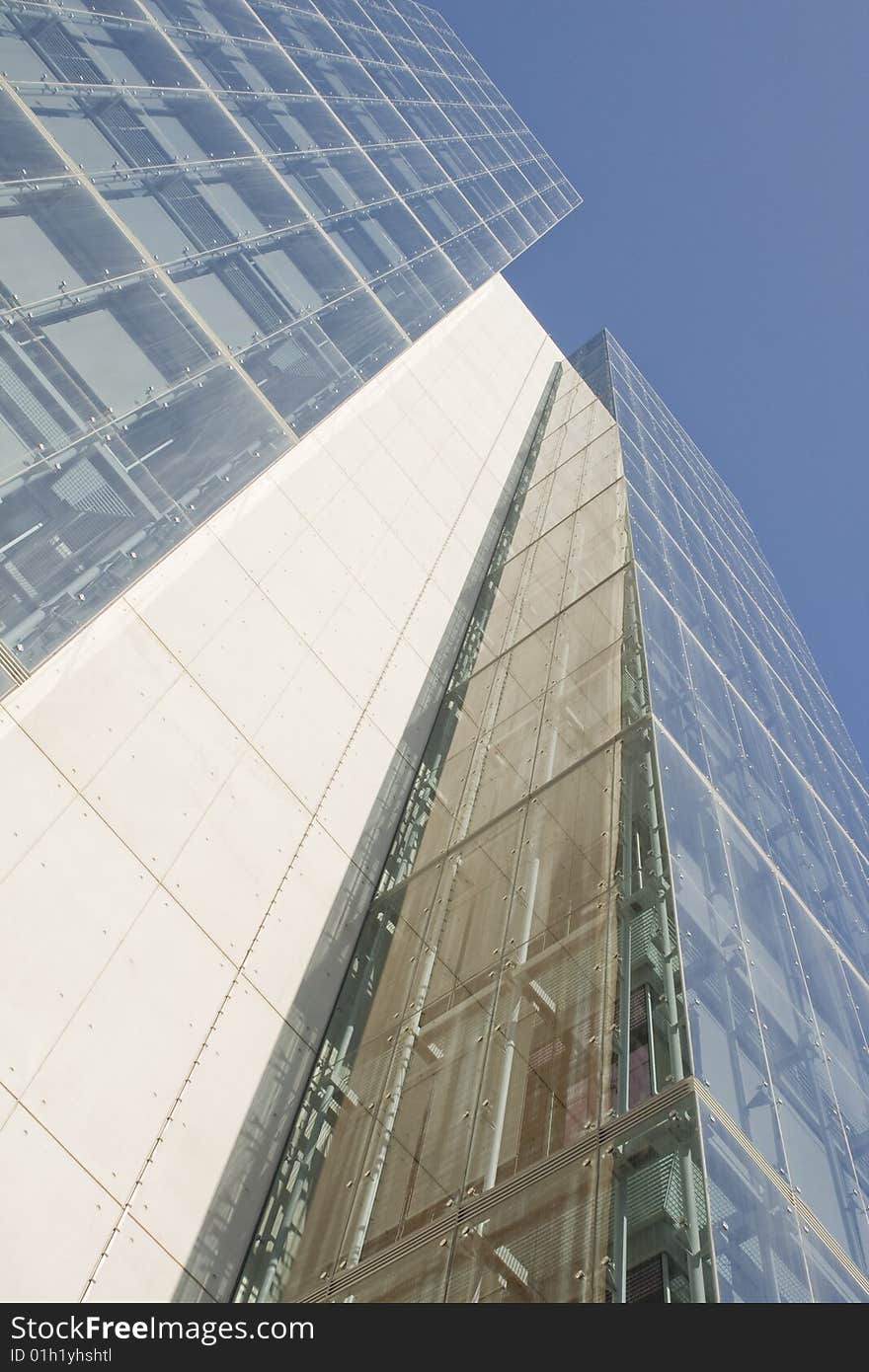 Modern office building on a background of blue sky