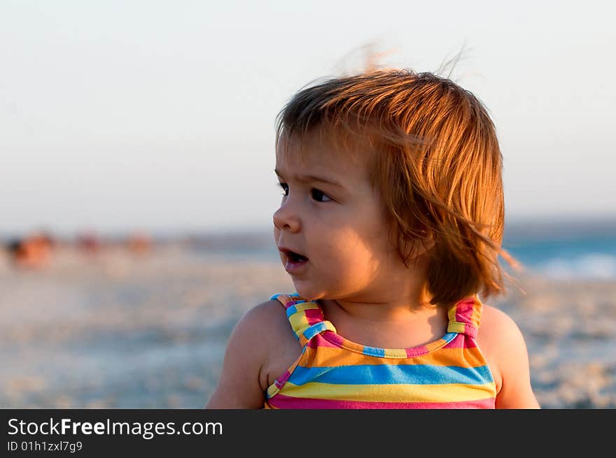 A young baby-girl on a beach down-under. A young baby-girl on a beach down-under