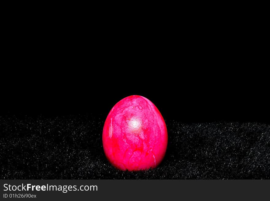 Beautiful Easter egg on the black background