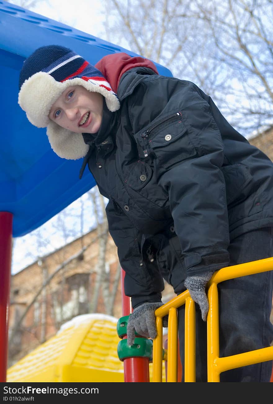 Blue-eyed boy in the winter stroll