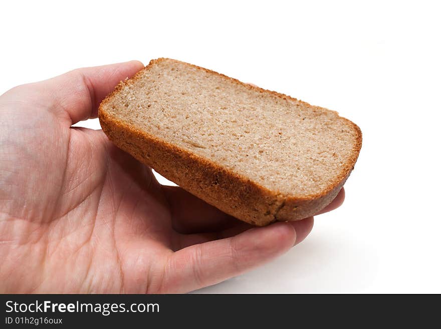 Piece of the pumpernickel in hand