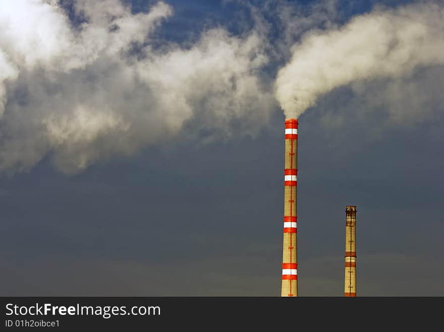 Exhaust and clouds of smoke in sky. Exhaust and clouds of smoke in sky