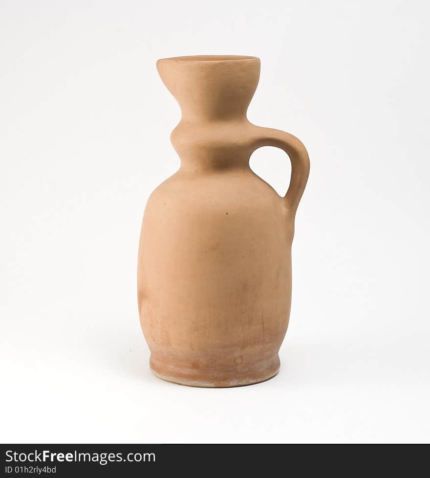 Old-time clay pot, vase, for use in households. Old-time clay pot, vase, for use in households