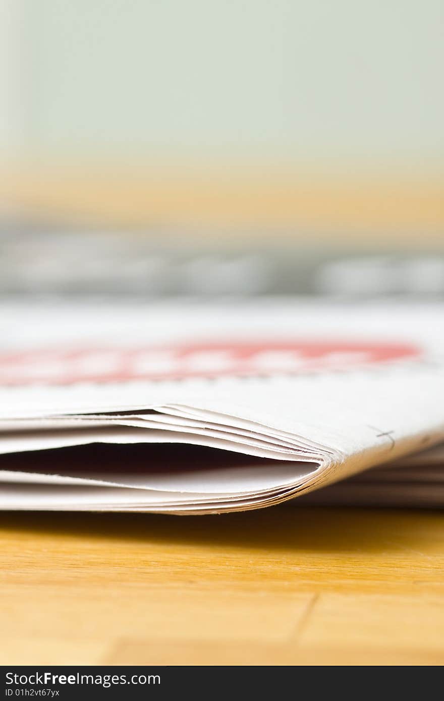 Daily newspaper on wooden table