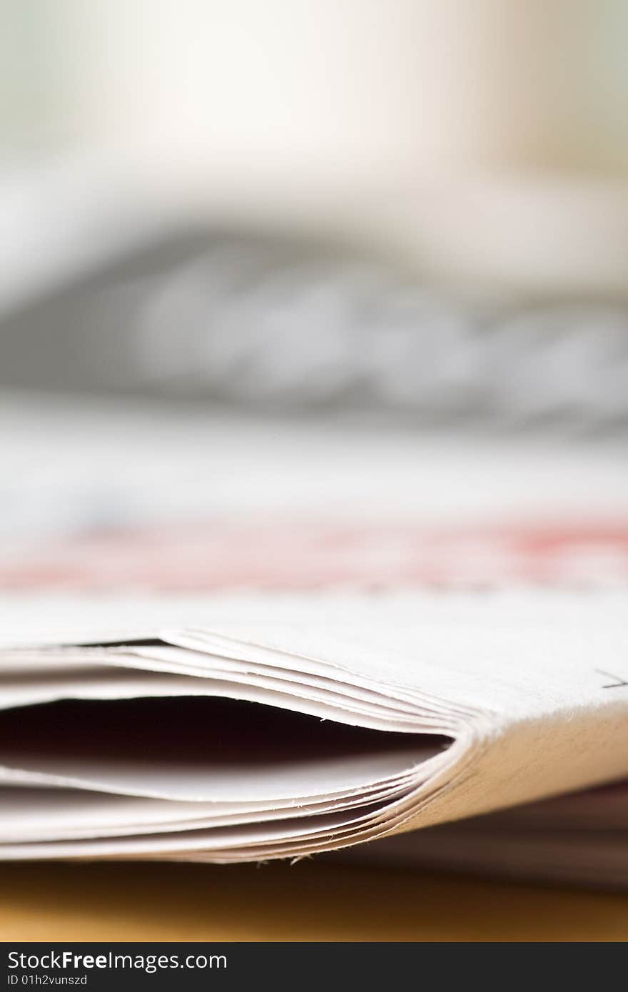 Daily newspaper on wooden table