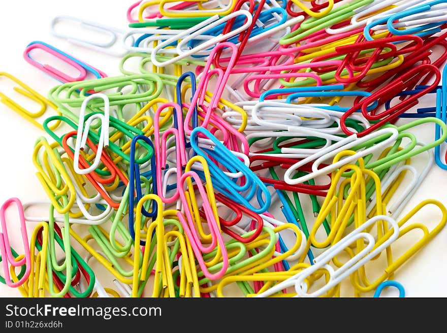 Close-up of paper clips on a white background