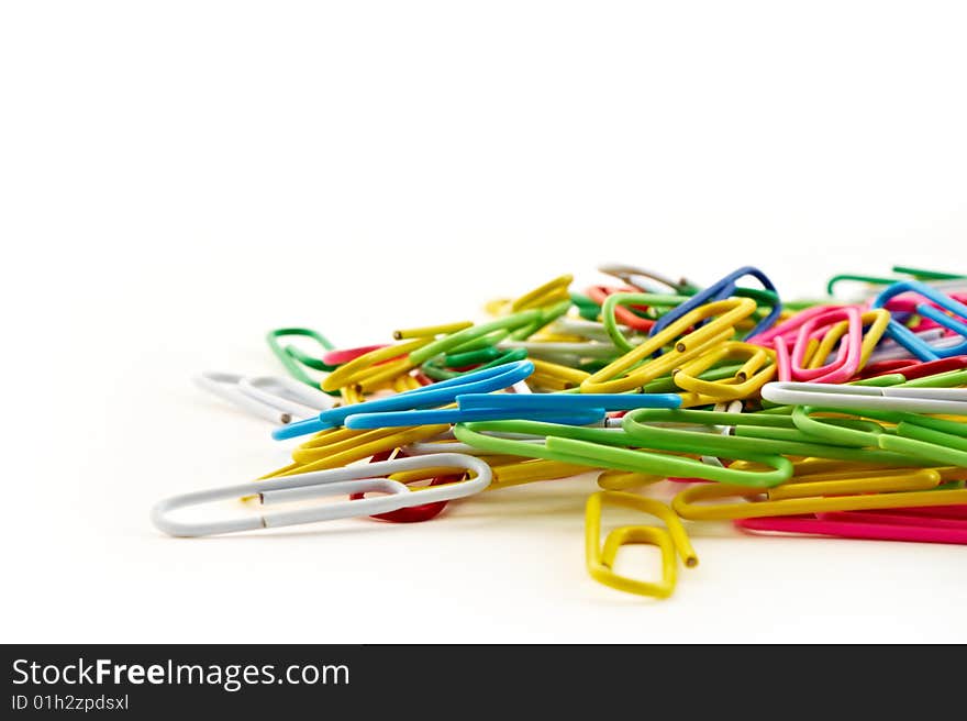 Close-up of paper clips on a white background