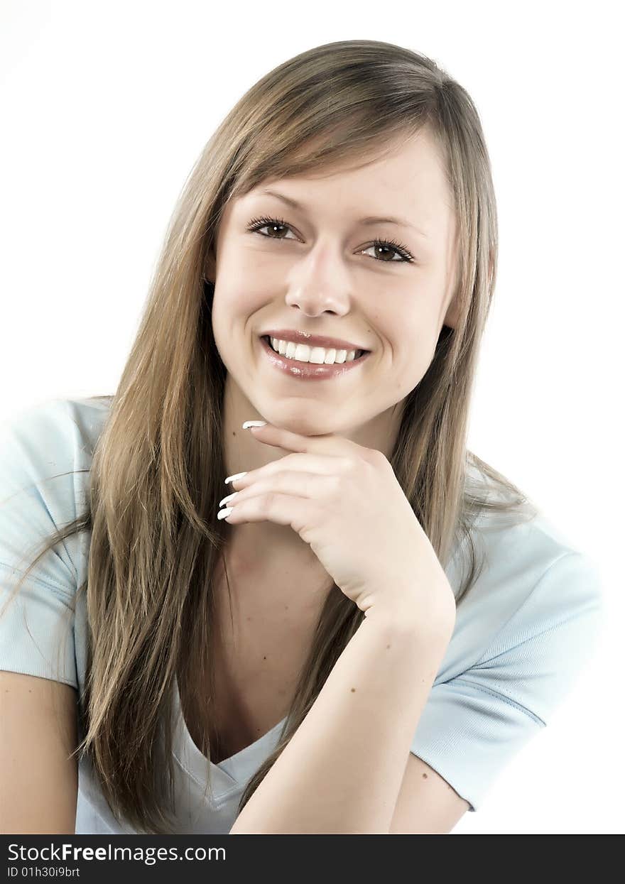 Closeup portrait of a happy young woman smiling isolated on white background