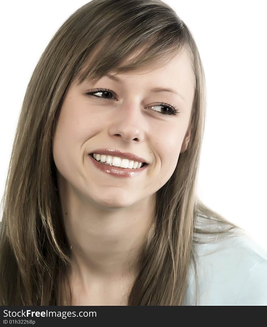 Closeup portrait of a happy young woman smiling isolated on white background