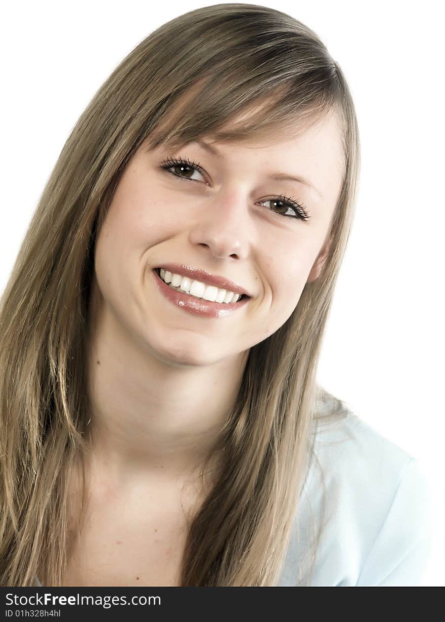 Closeup portrait of a happy young woman smiling isolated on white background