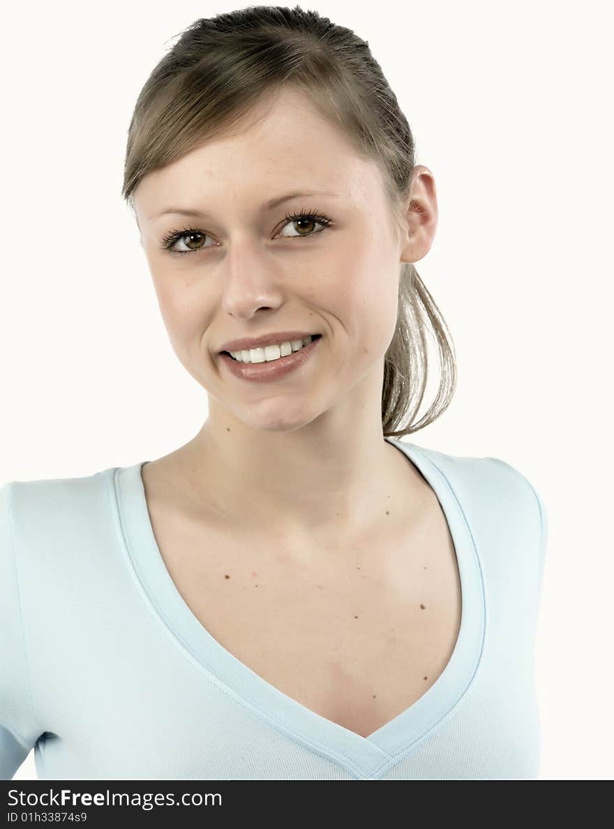 Closeup portrait of a happy young woman smiling isolated on white background