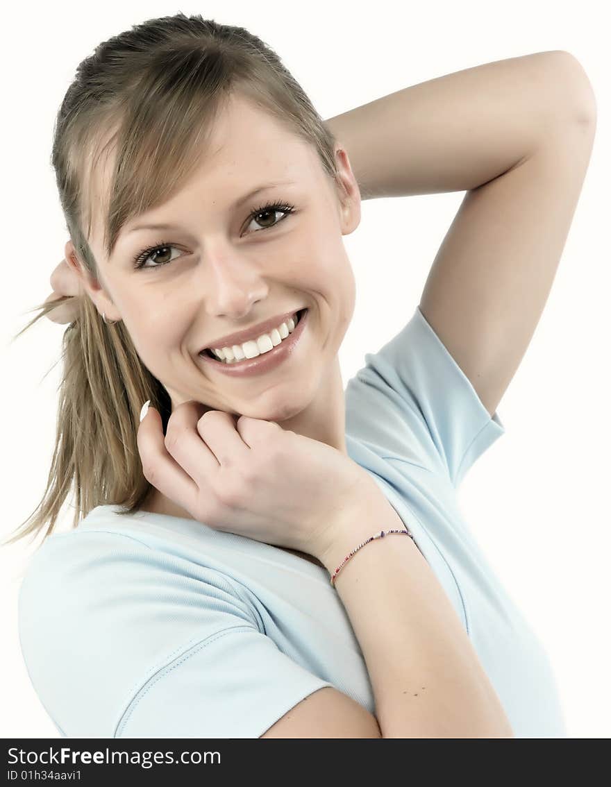 Closeup portrait of a happy young woman smiling isolated on white background