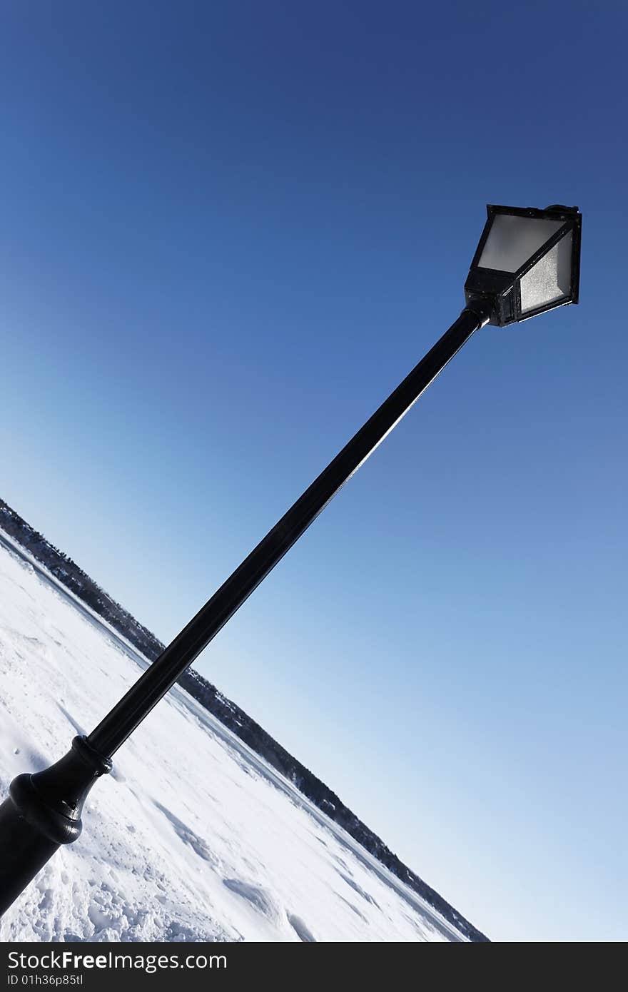 Old lantern with landscape background. Old lantern with landscape background