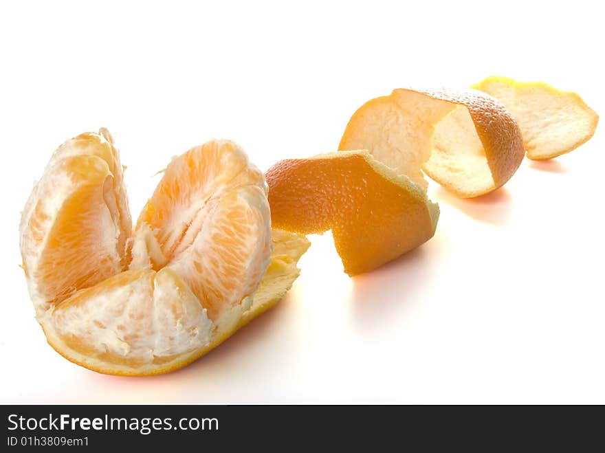 There is a orange on the white background. There is a orange on the white background