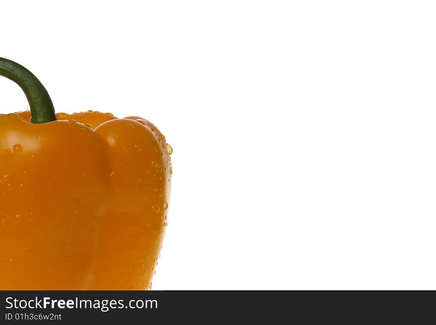 Yellow pepper and drops of water on a white background. Yellow pepper and drops of water on a white background.