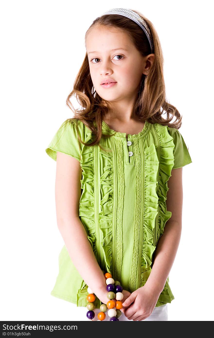 Young brunette child posing in different clothes. Young brunette child posing in different clothes