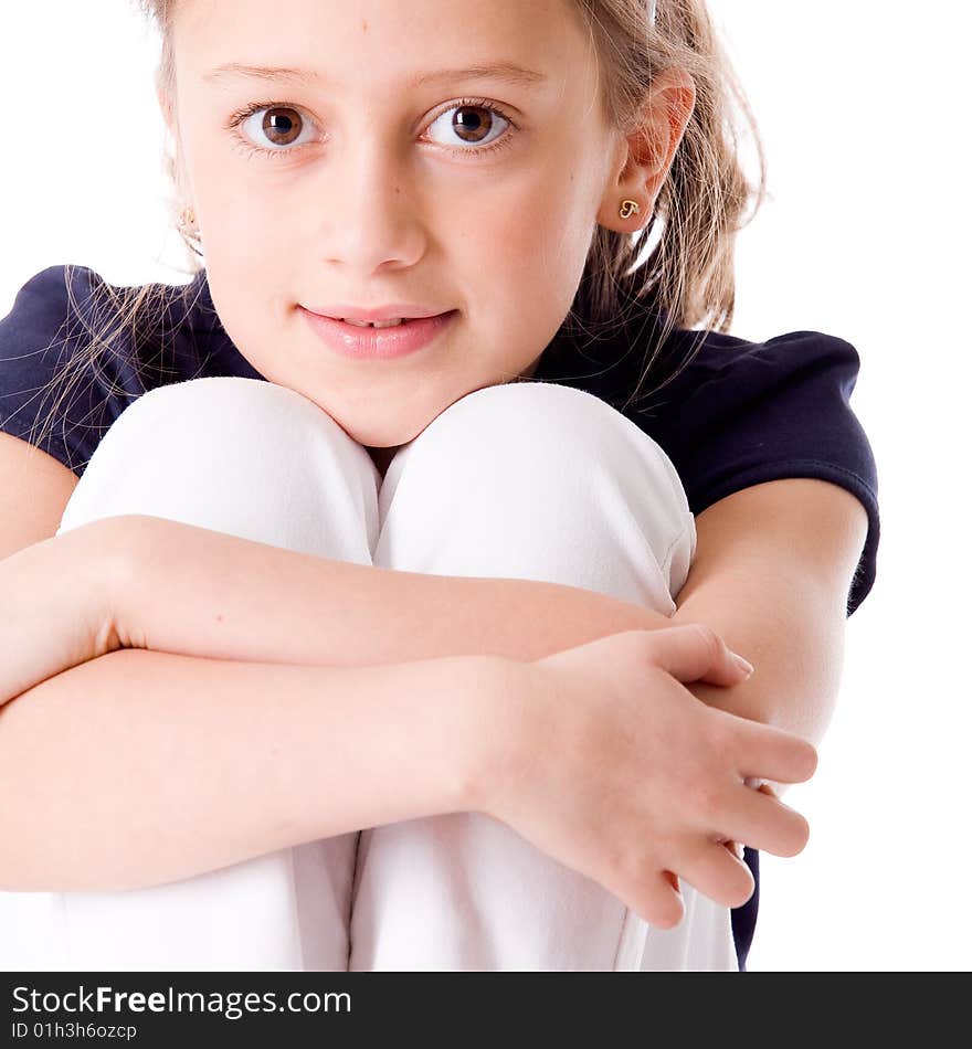 Young brunette child posing in different clothes. Young brunette child posing in different clothes