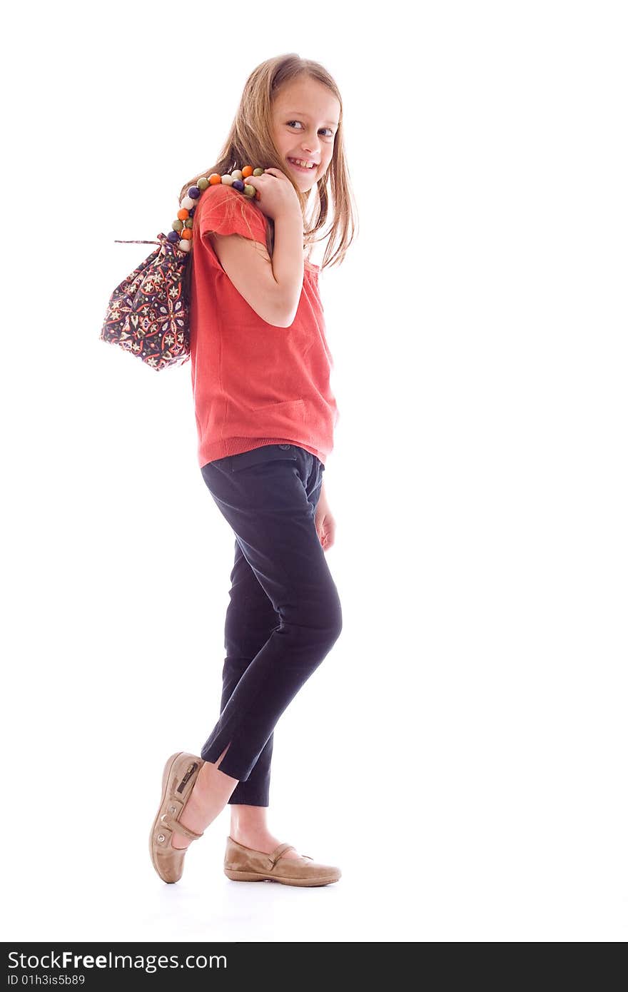 Young brunette child posing in different clothes. Young brunette child posing in different clothes