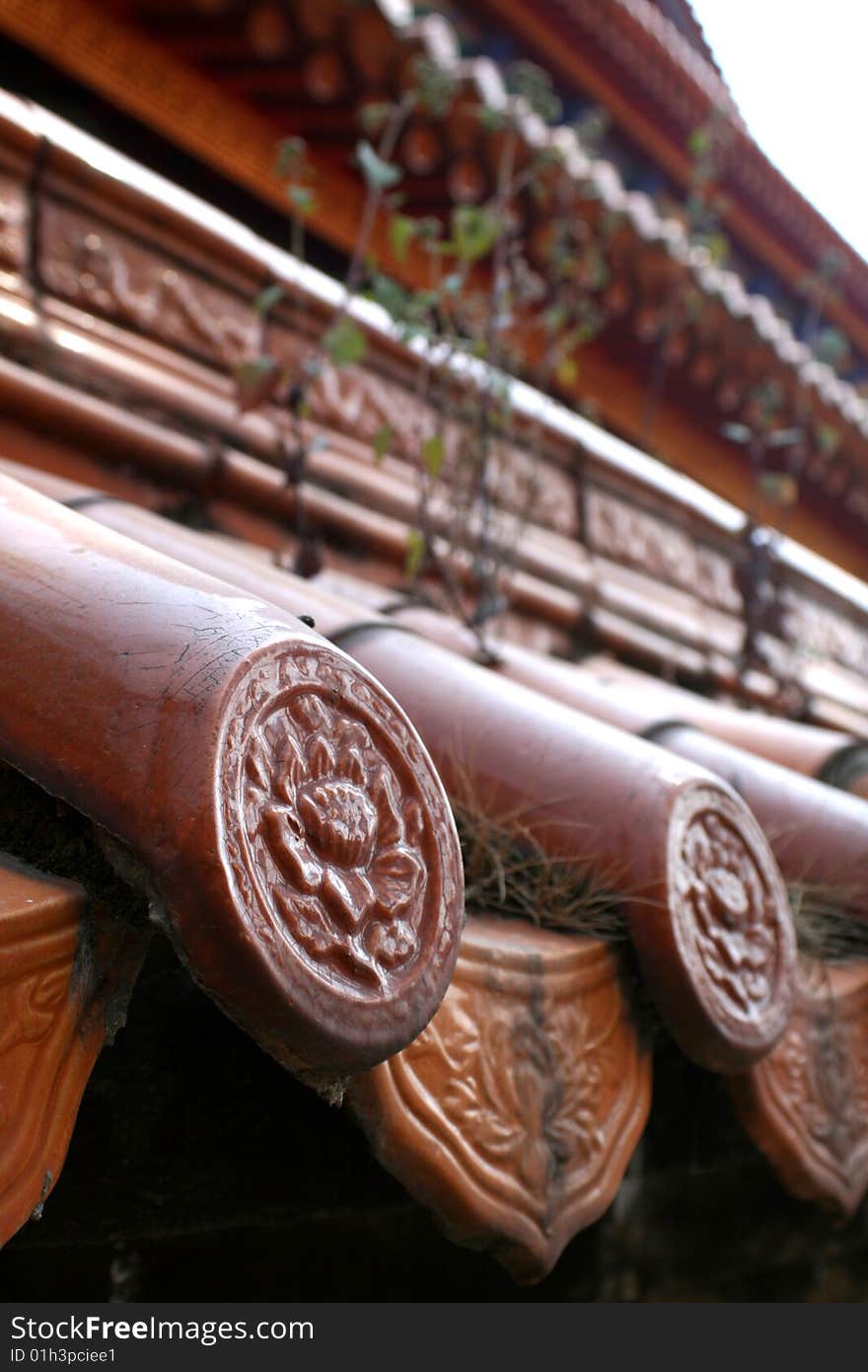 Traditional Chinese roof tiles in a temple in Kunming, China