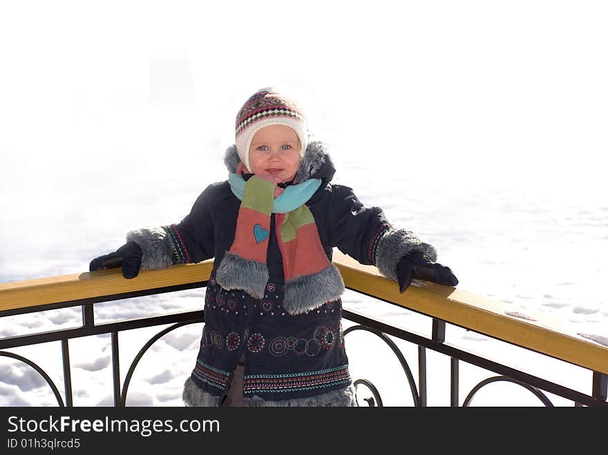 Little girl walks sunny winter day. Little girl walks sunny winter day