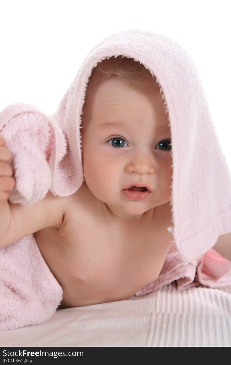 Happy child with towel on head isolated on white.