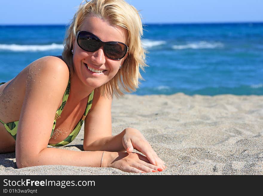 Beautiful Girl Lies On  Beach