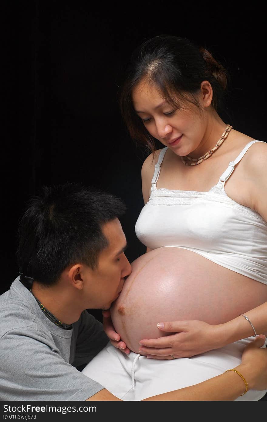 Happy Couple Expecting Newborn