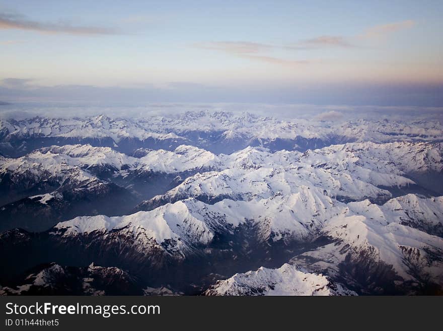 Snow-capped Mountains From The Plane