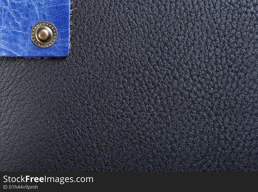 Black and blue leather and one button.
Macro texture, good details. Black and blue leather and one button.
Macro texture, good details.