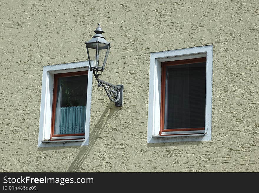 Two square windows with street lamp. Two square windows with street lamp