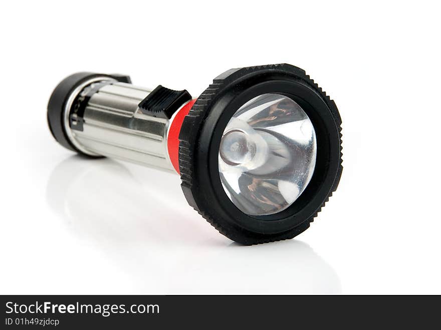 Metal pocket torch isolated over white background