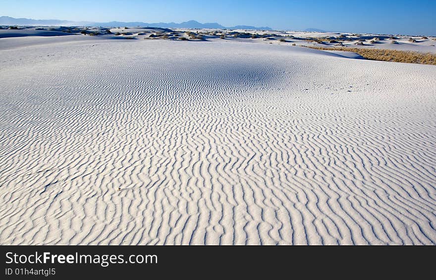 View of a rippled sand dune in the White Sands of New Mexico. View of a rippled sand dune in the White Sands of New Mexico.