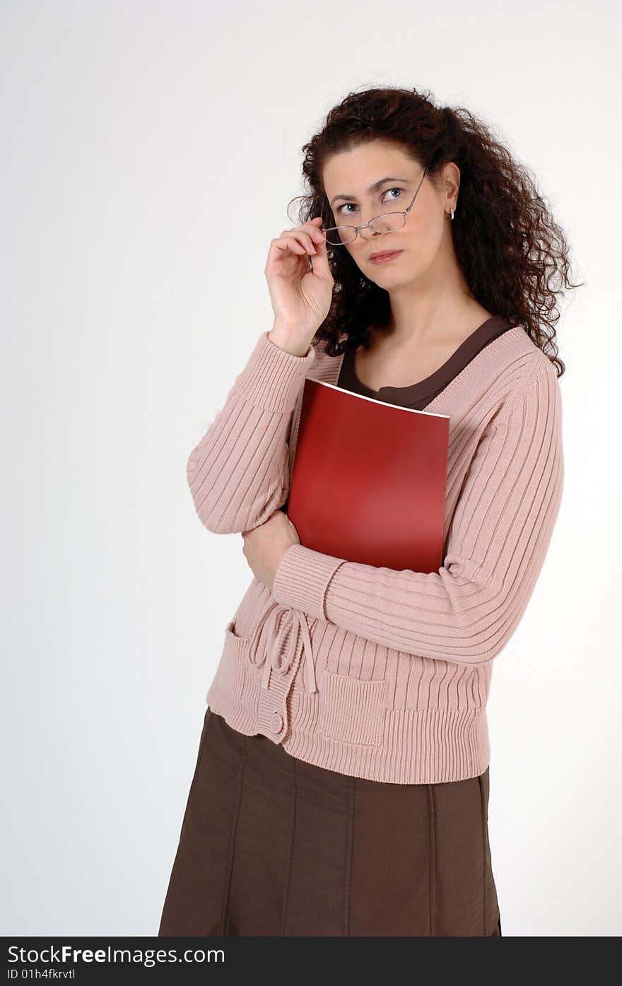 Female with glasses and a red book