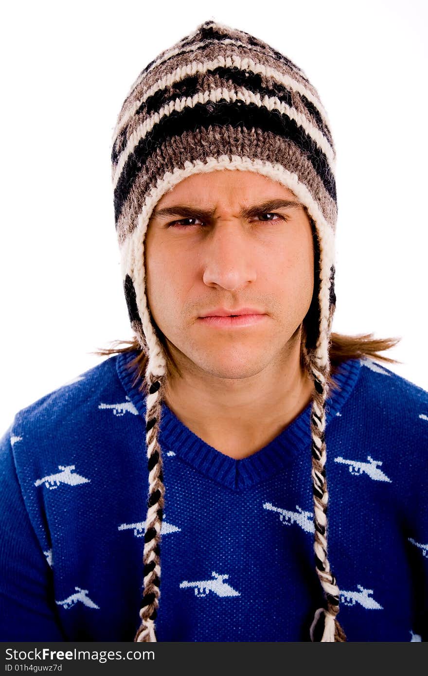 Top view of young man looking through lens against white background