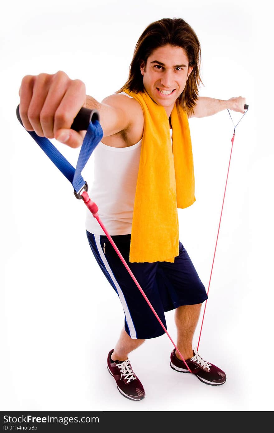 Front view of male carrying racket