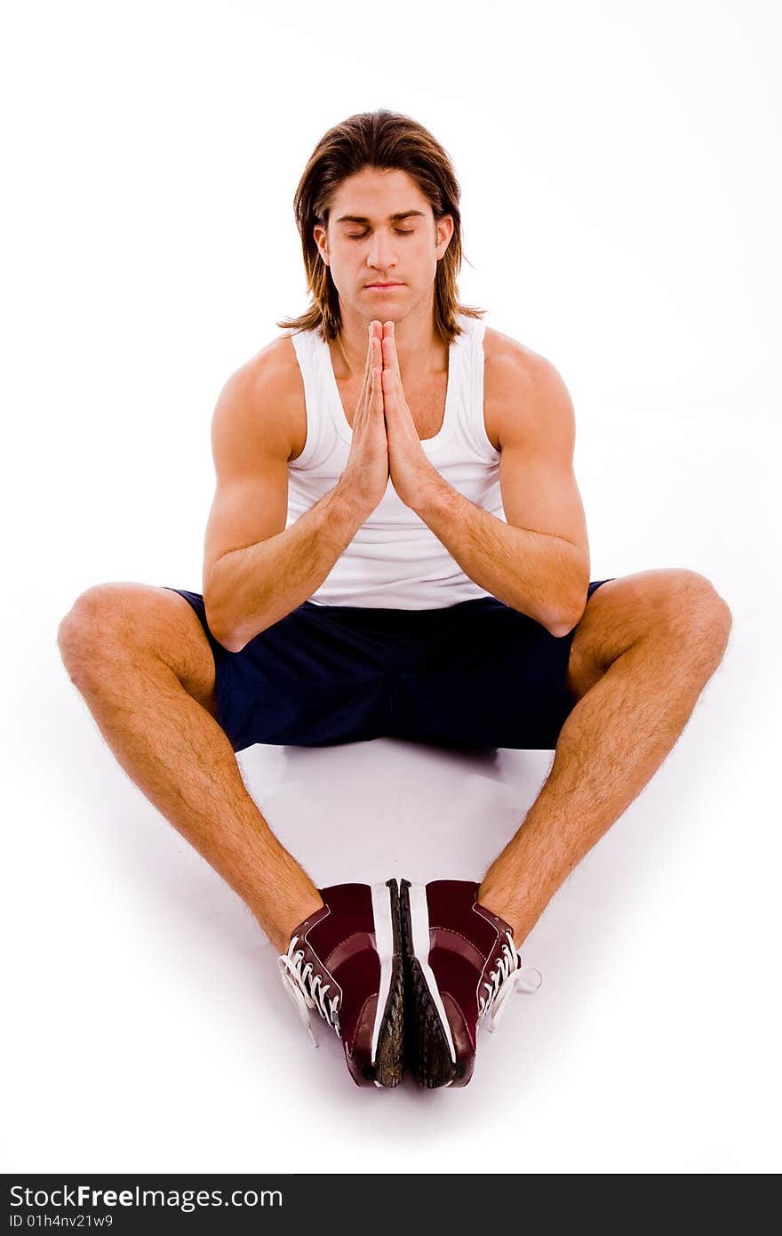 Portrait of powerful man showing muscles on an isolated white background