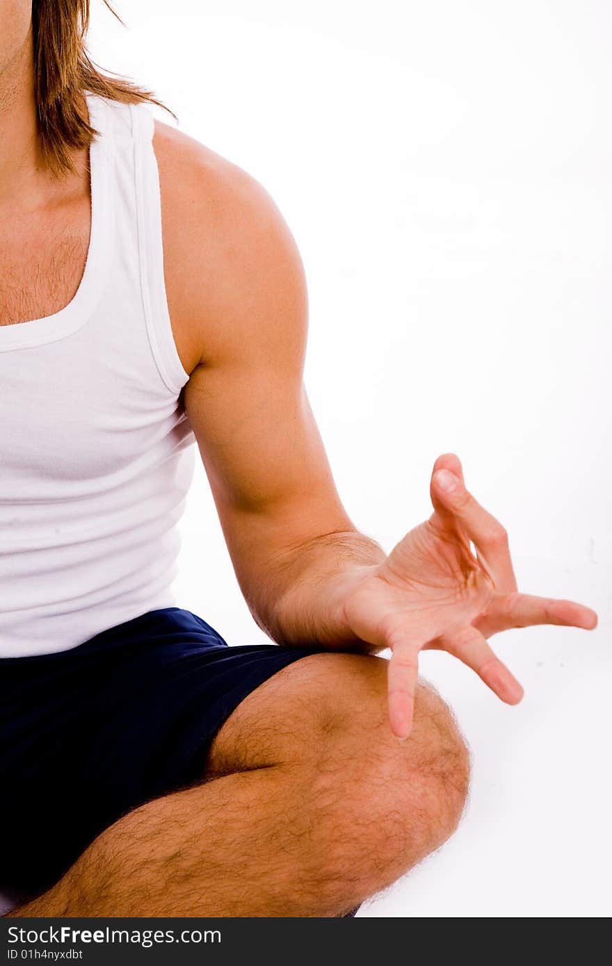 Portrait of powerful man showing muscles on an isolated white background