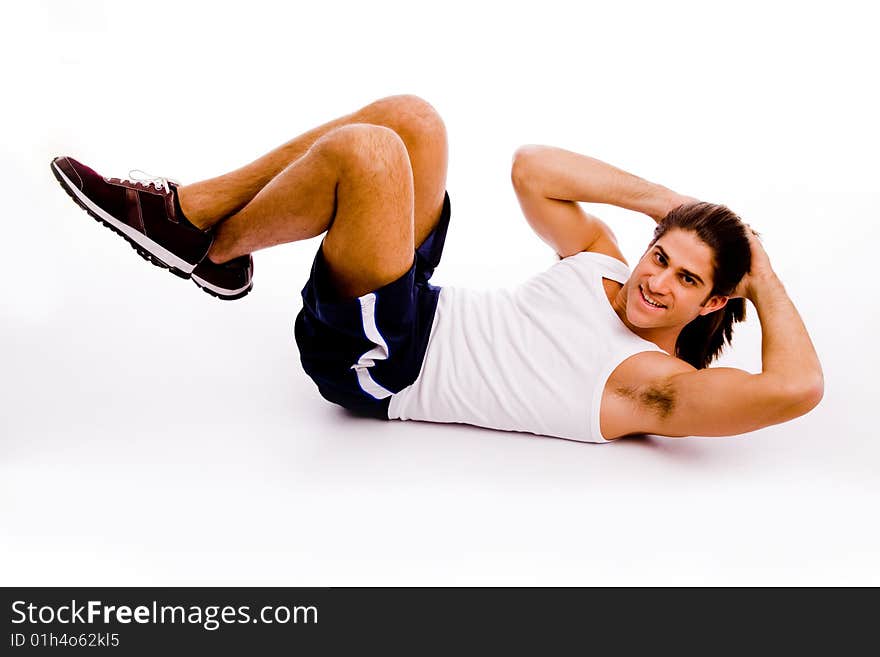 Portrait of powerful man showing muscles on an isolated white background