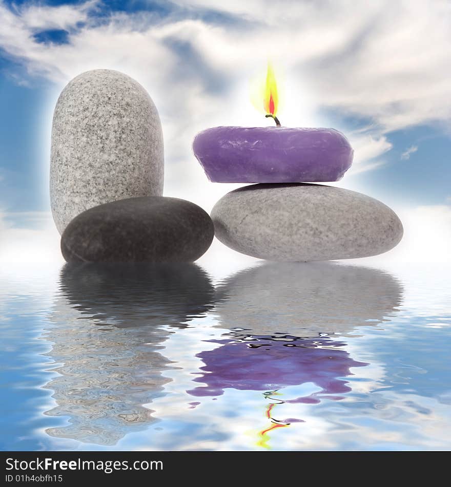 Candle and River Stones