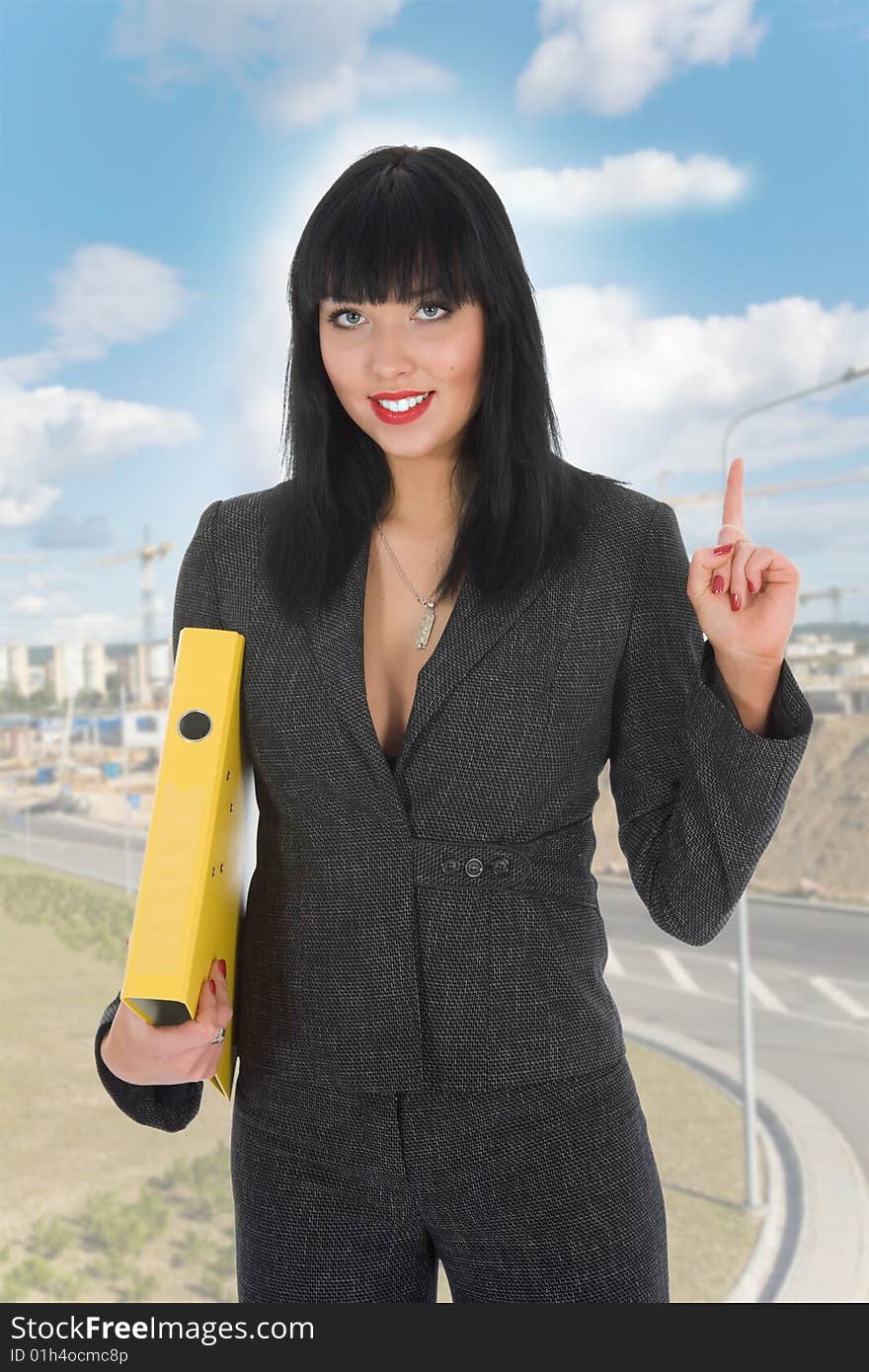 Business woman on construction background