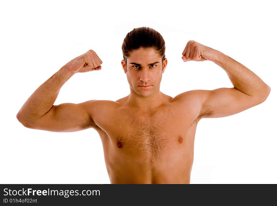 Portrait of powerful man showing muscles on an isolated white background