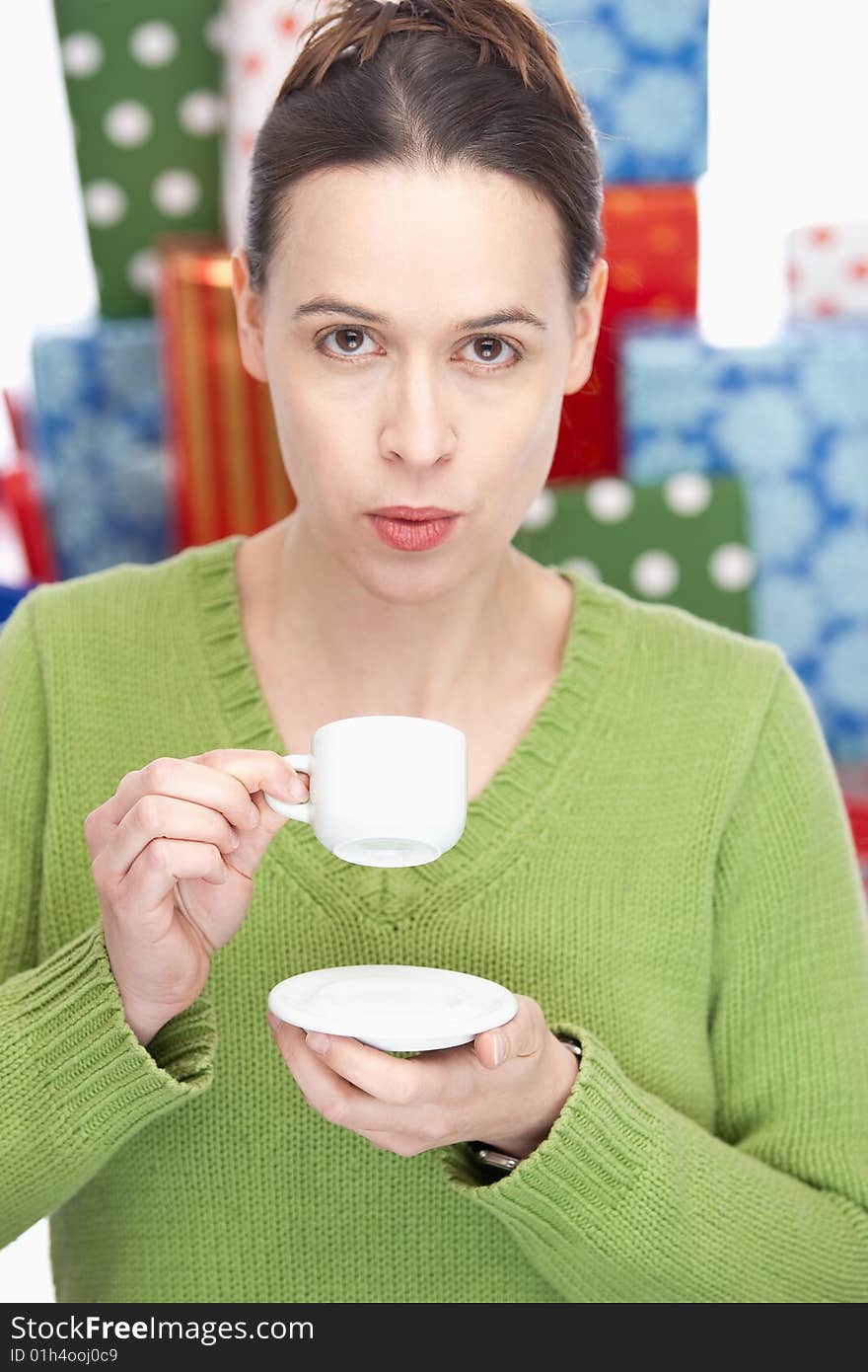 A woman having an espresso, taking a break - shallow depth of field. A woman having an espresso, taking a break - shallow depth of field.