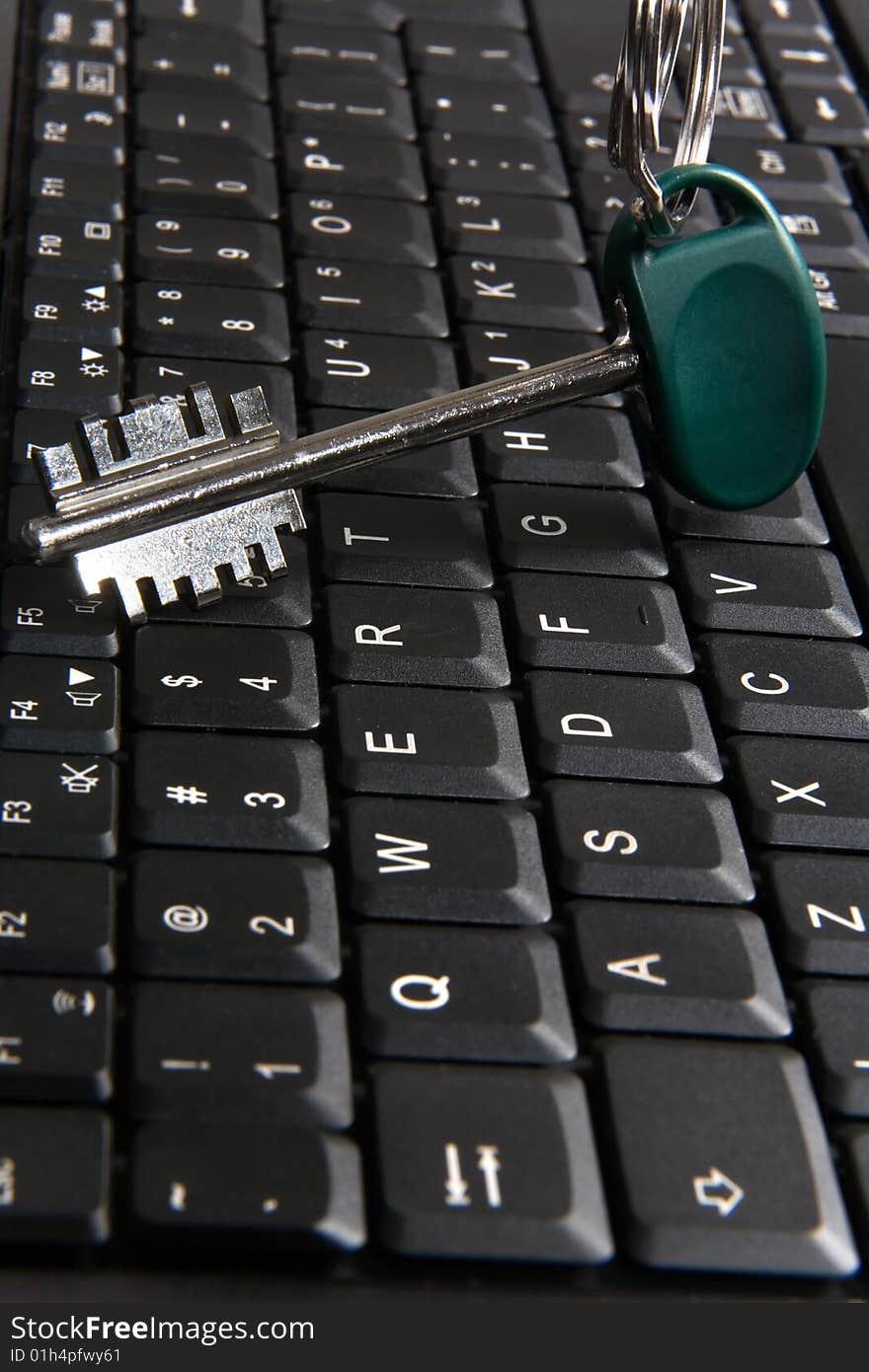 Computer Security conception. Key on laptop