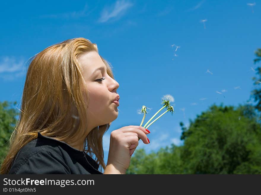 Girl and dandelion