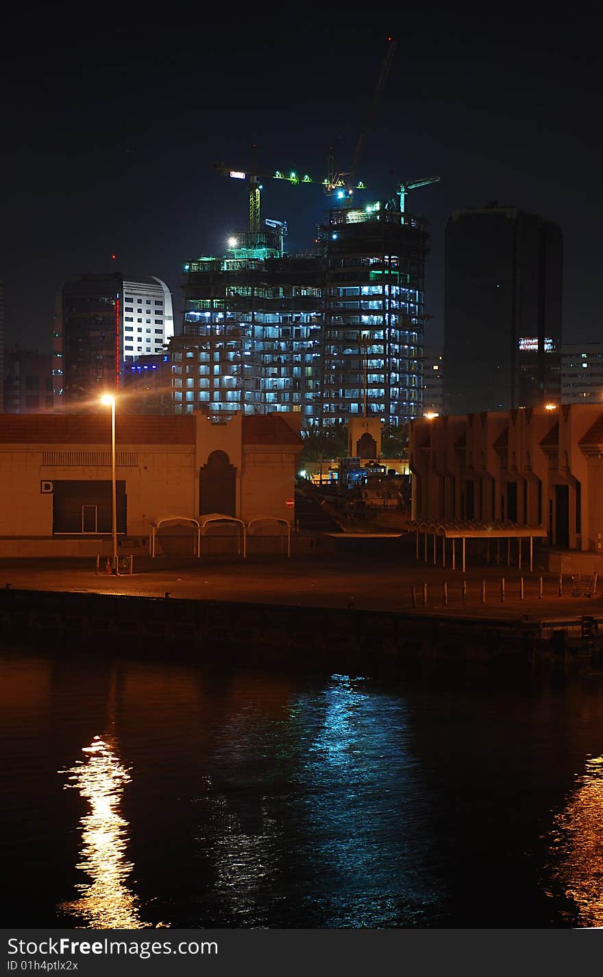 Illuminated under construction building near Dubai