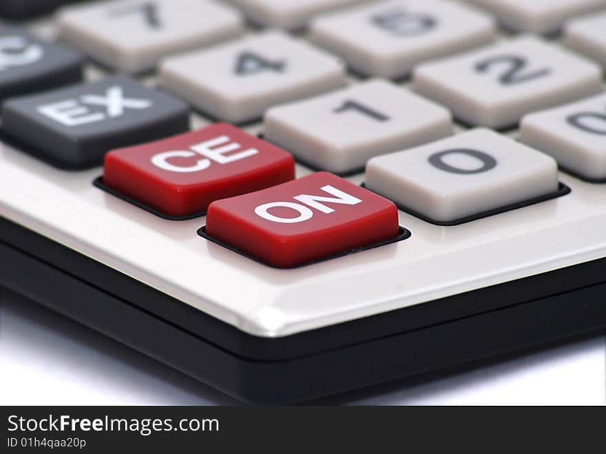 Closeup of a calculator keyboard. ON button in focus.