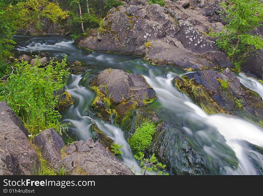 Small waterfall in the green forest. Small waterfall in the green forest