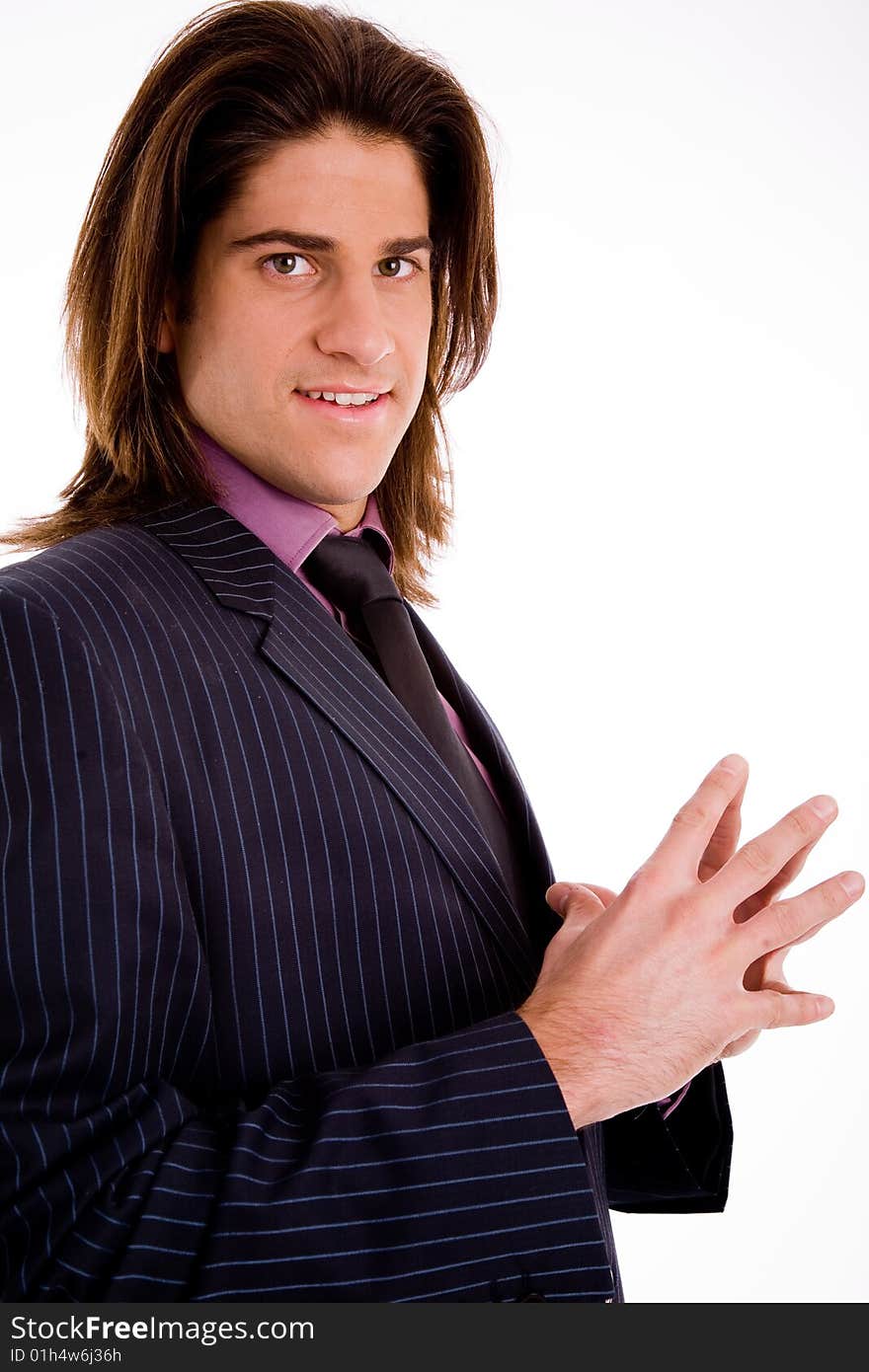 Side view of standing successful businessman with white background